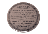 A large and unusual coloured lid bearing ten different typefaces. S 75 Ronald Dale.  